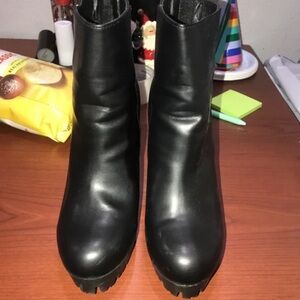 Sleek Black Heeled Boots